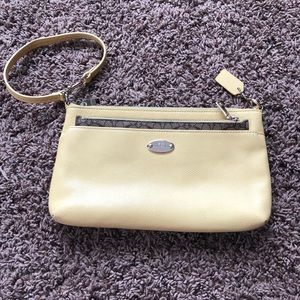 Coach clutch purse with wrist strap
